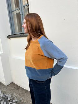 Weitere Designs – blaue Pflaume-Messing