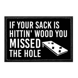 CORNHOLE – IF YOUR SACK IS HITTIN' WOOD YOU MISSED THE HOLE