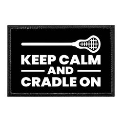LACROSSE – KEEP CALM AND CRADLE ON